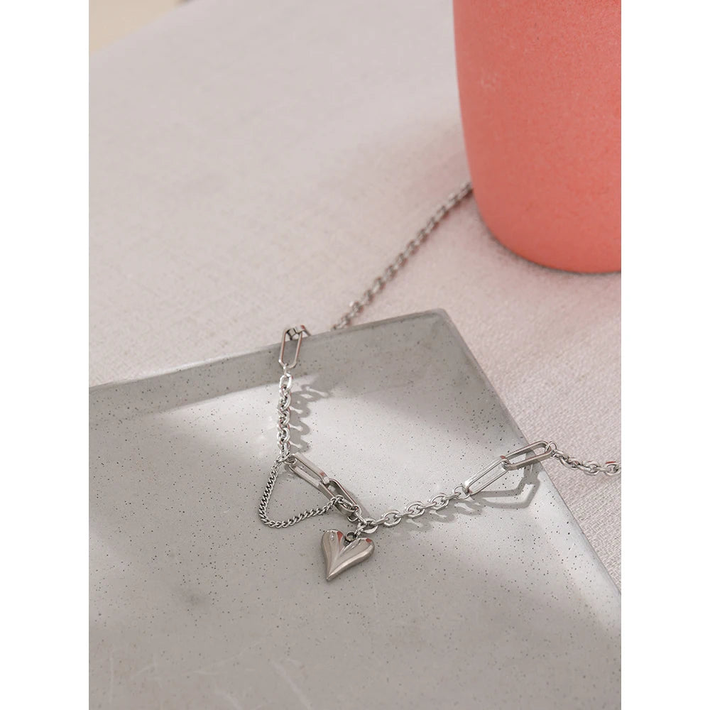 Evermore Heart Pendant, waterproof necklace in 316L stainless steel with a gold PVD finish by Lark & Reed, view 4