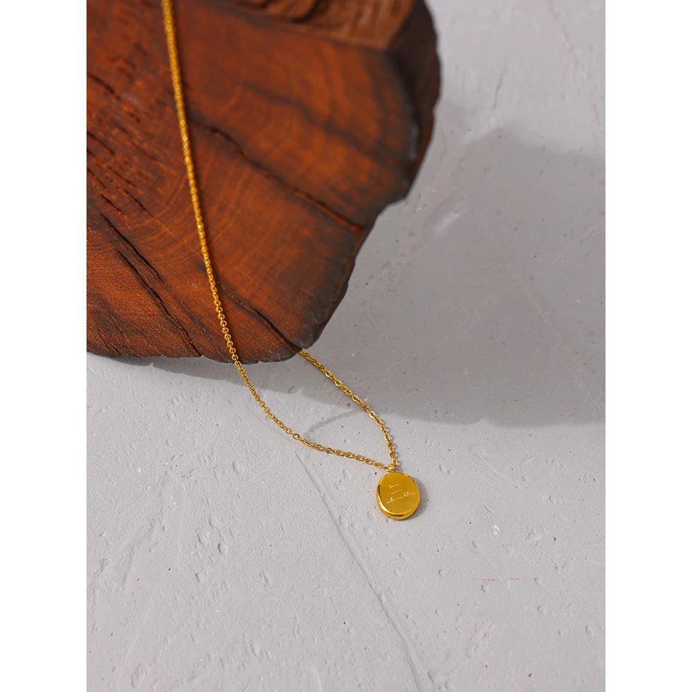 Siena Coin Pendant, waterproof necklace in 316L stainless steel with a gold or silver-tone PVD finish by Lark & Reed, view 4