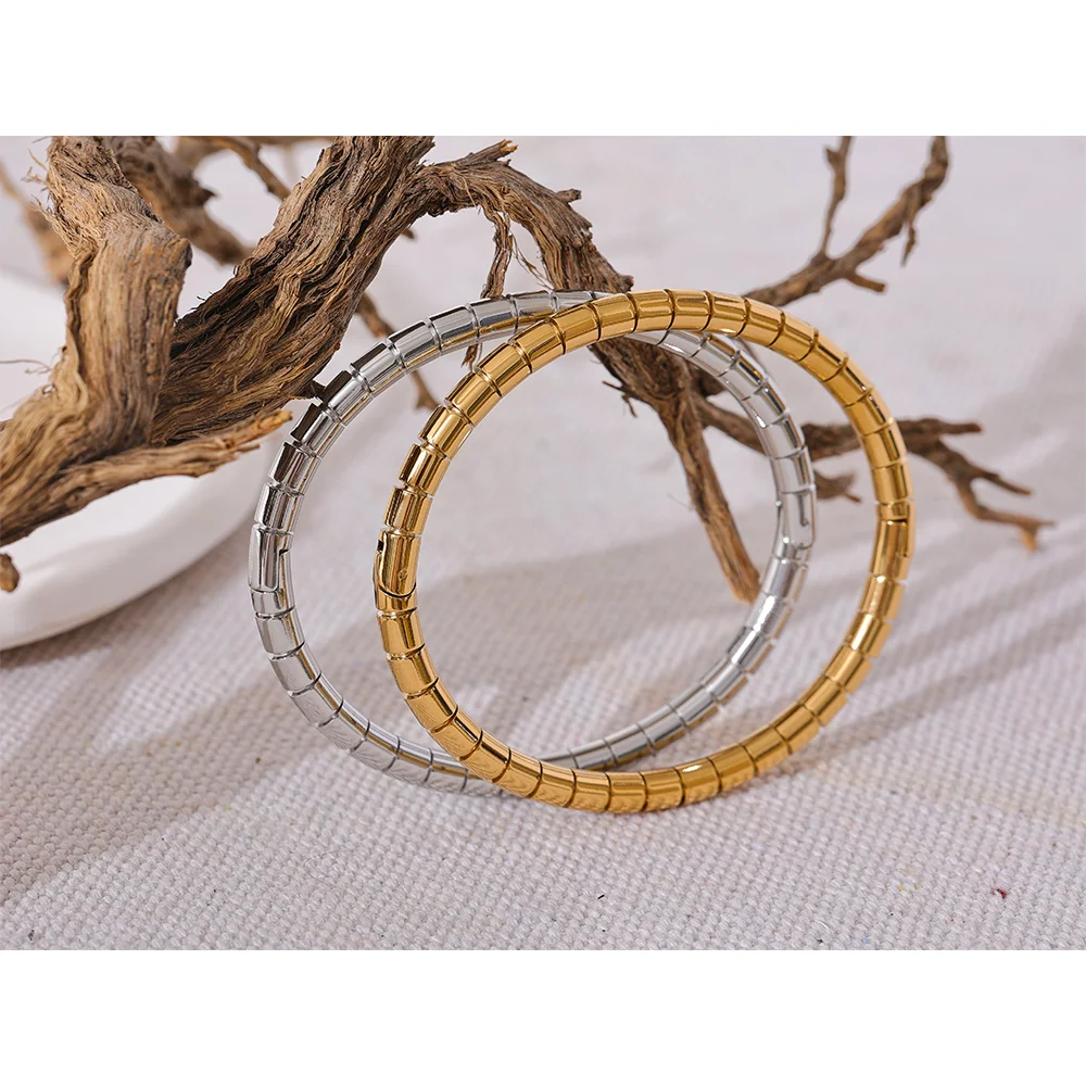 Utrecht Curved Bangle, waterproof bracelet in 316L stainless steel with a gold or silver-tone PVD finish by Lark & Reed, view 3