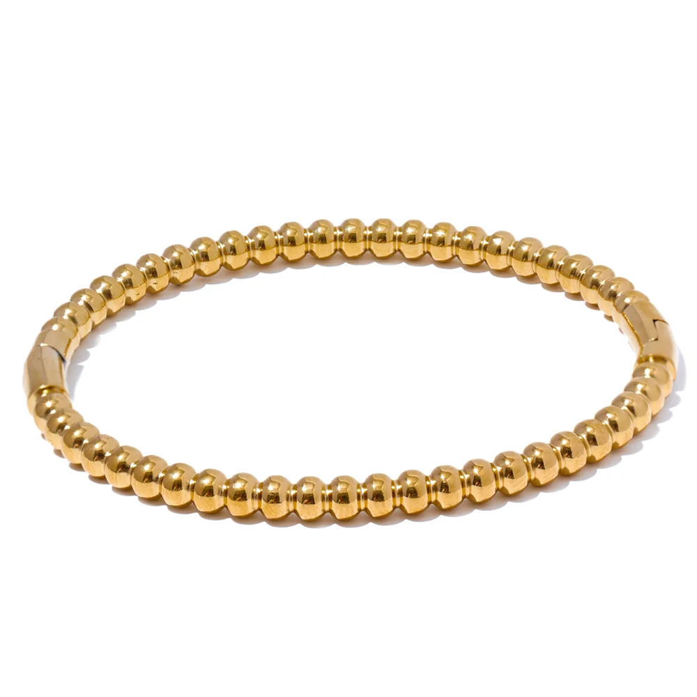 Kalmar Twisted Bangle, waterproof bracelet in 316L stainless steel with a gold or silver-tone PVD finish by Lark & Reed, view 8