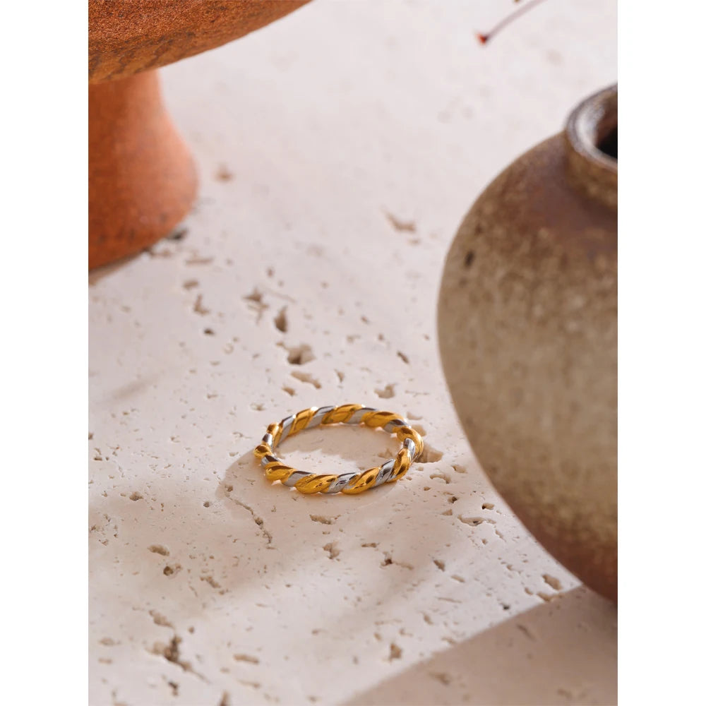 Vilja Two-Tone Twist Ring, waterproof ring in 316L stainless steel with a gold PVD finish by Lark & Reed, view 5