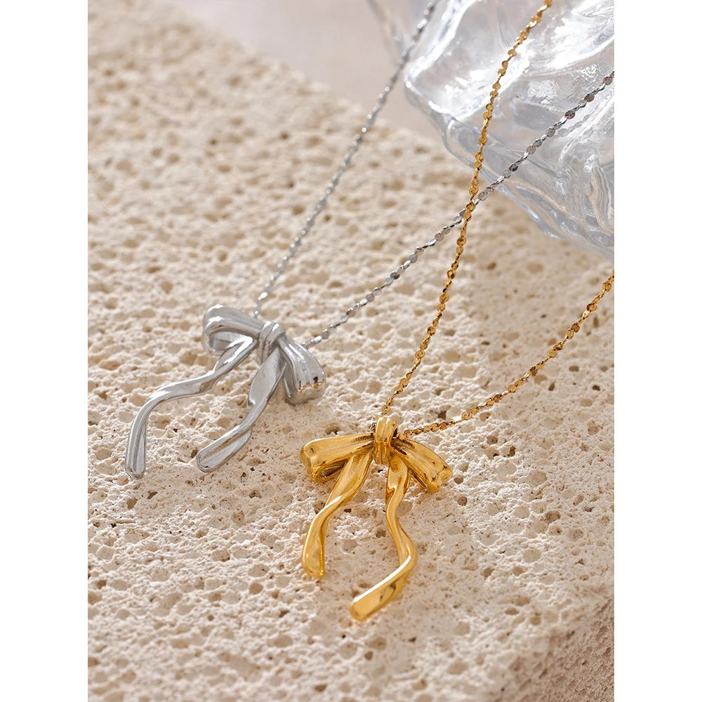 Cecile Bow Pendant, waterproof necklace in 316L stainless steel with a gold or silver-tone PVD finish by Lark & Reed, view 5