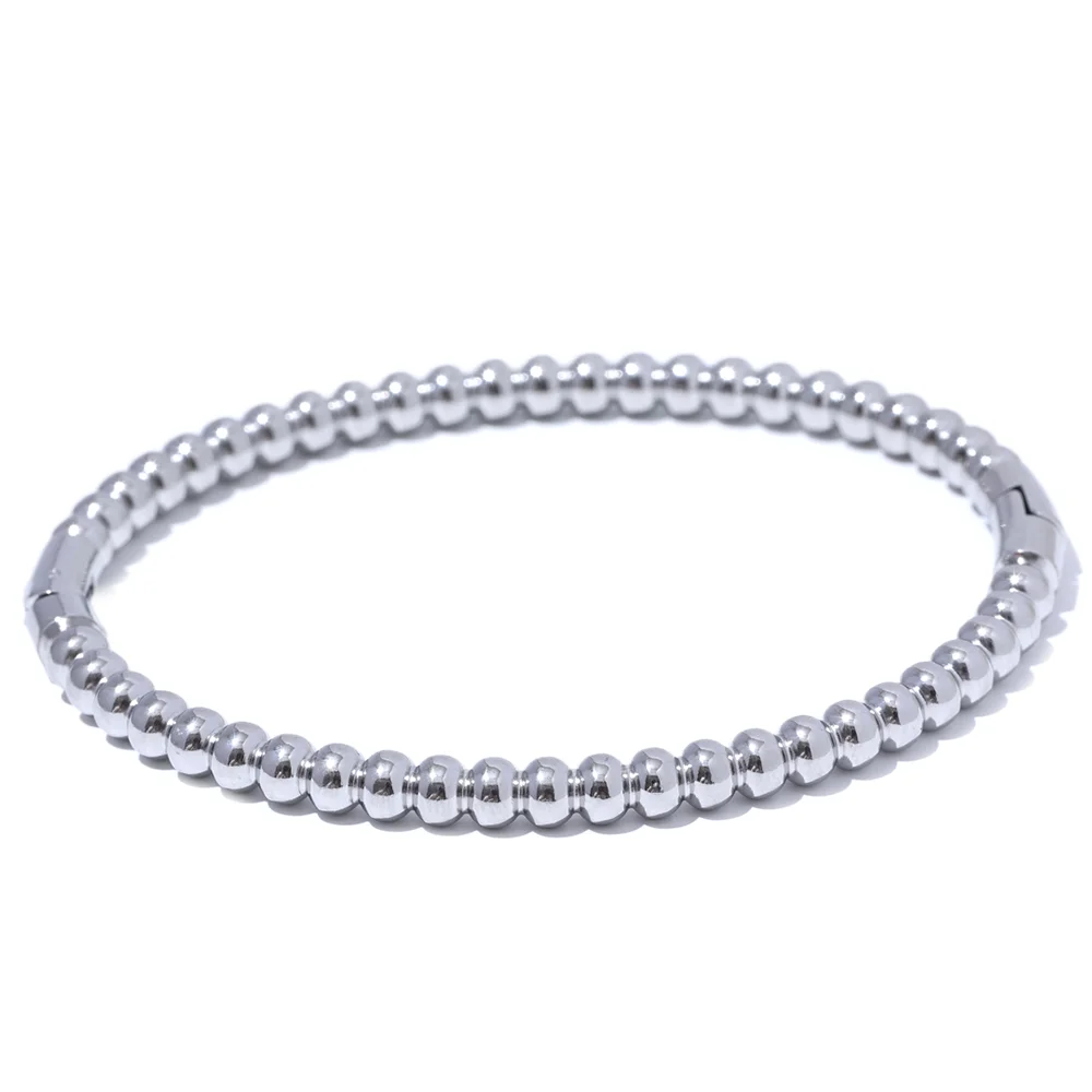 Kalmar Twisted Bangle, waterproof bracelet in 316L stainless steel with a gold or silver-tone PVD finish by Lark & Reed, view 7