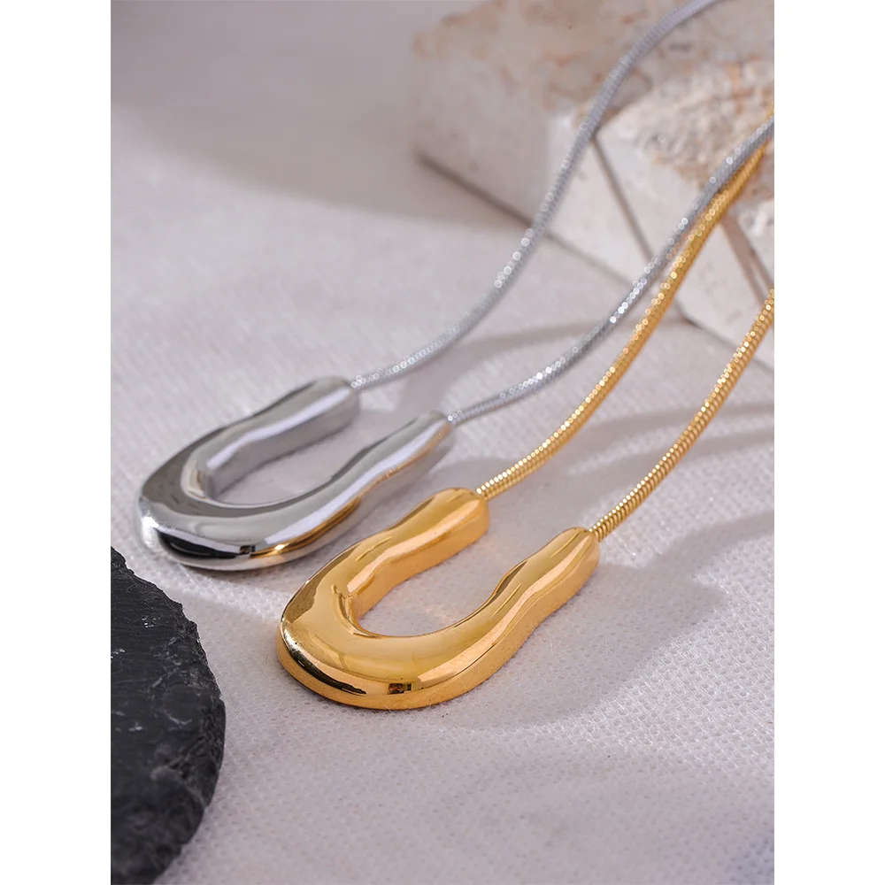 Hedda Sculpted U Pendant, waterproof necklace in 316L stainless steel with a gold or silver-tone PVD finish by Lark & Reed, view 3