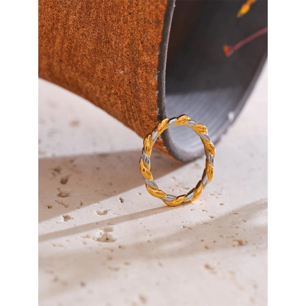 Vilja Two-Tone Twist Ring, waterproof ring in 316L stainless steel with a gold PVD finish by Lark & Reed, view 3