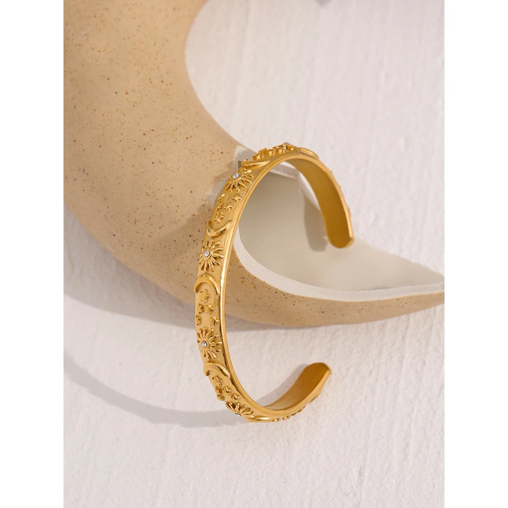 Celestia Engraved Cuff, waterproof bracelet in 316L stainless steel with a gold PVD finish by Lark & Reed, view 4