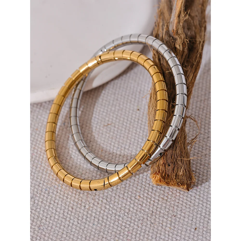 Utrecht Curved Bangle, waterproof bracelet in 316L stainless steel with a gold or silver-tone PVD finish by Lark & Reed, view 6