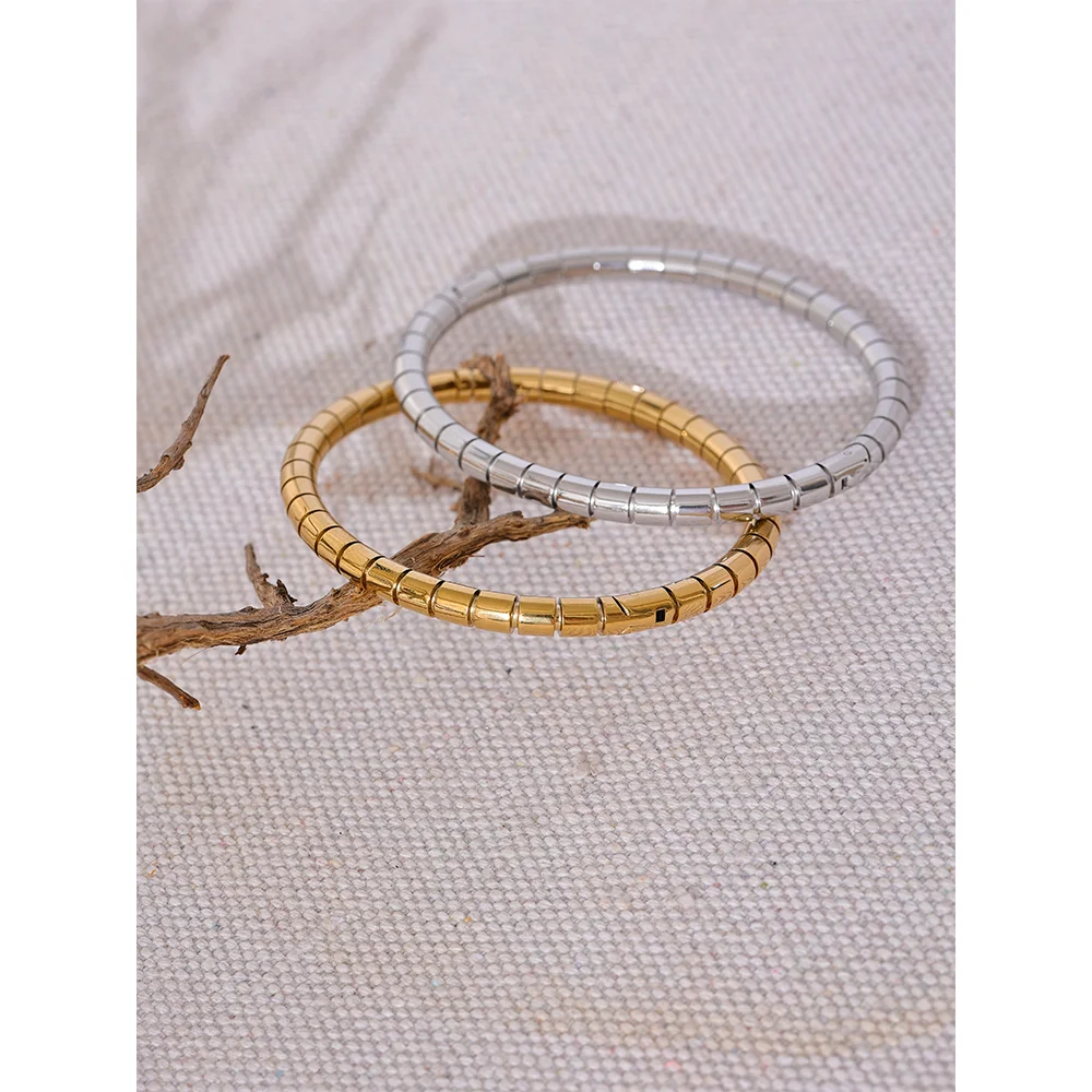 Utrecht Curved Bangle, waterproof bracelet in 316L stainless steel with a gold or silver-tone PVD finish by Lark & Reed, view 5