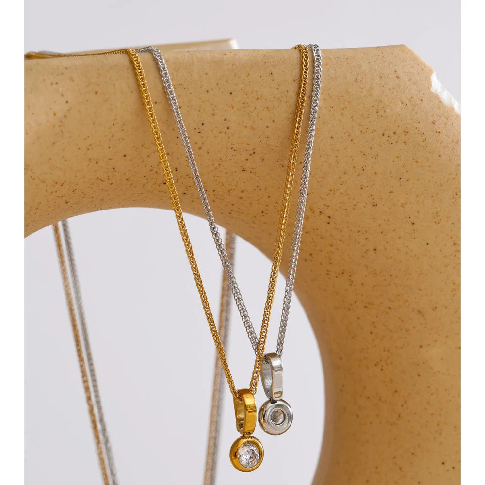 Tilde Bezel Crystal Pendant, waterproof necklace in 316L stainless steel with a gold or silver-tone PVD finish by Lark & Reed, view 2