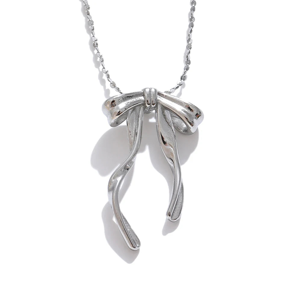 Cecile Bow Pendant, waterproof necklace in 316L stainless steel with a gold or silver-tone PVD finish by Lark & Reed, view 7