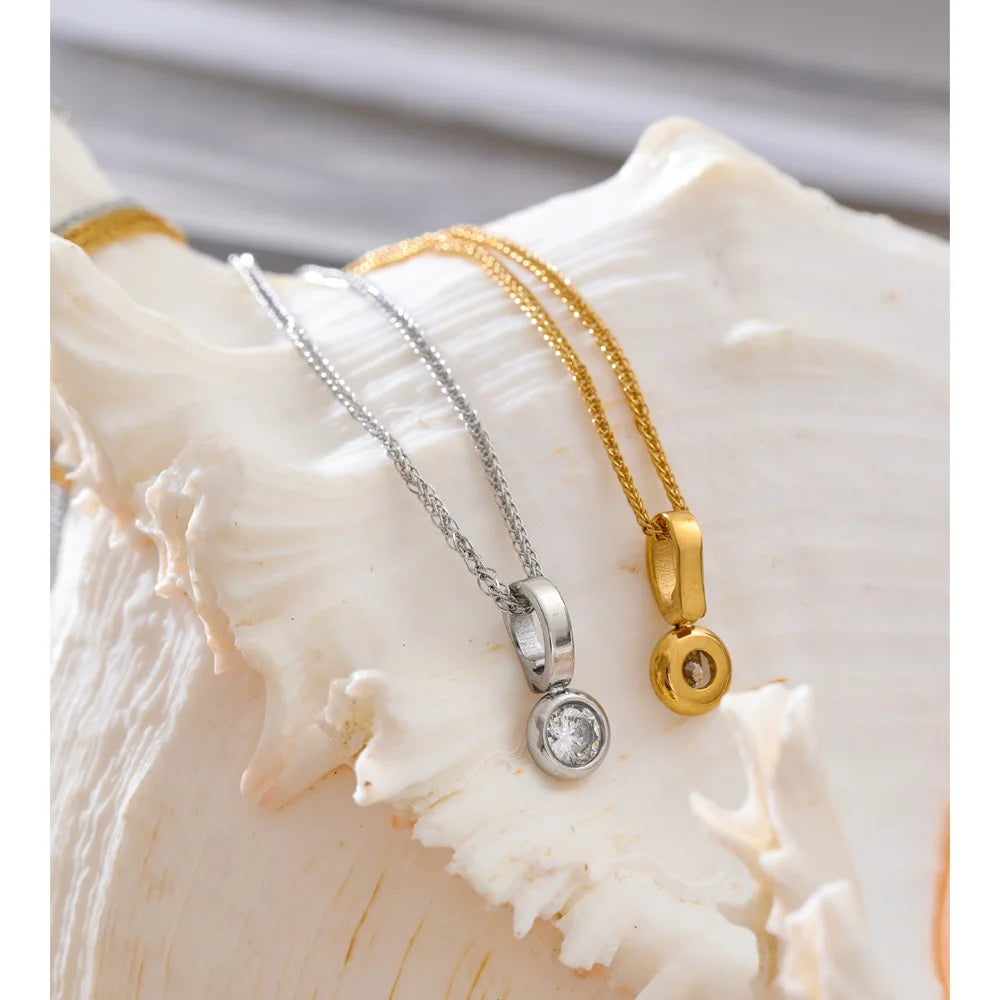Tilde Bezel Crystal Pendant, waterproof necklace in 316L stainless steel with a gold or silver-tone PVD finish by Lark & Reed, view 4