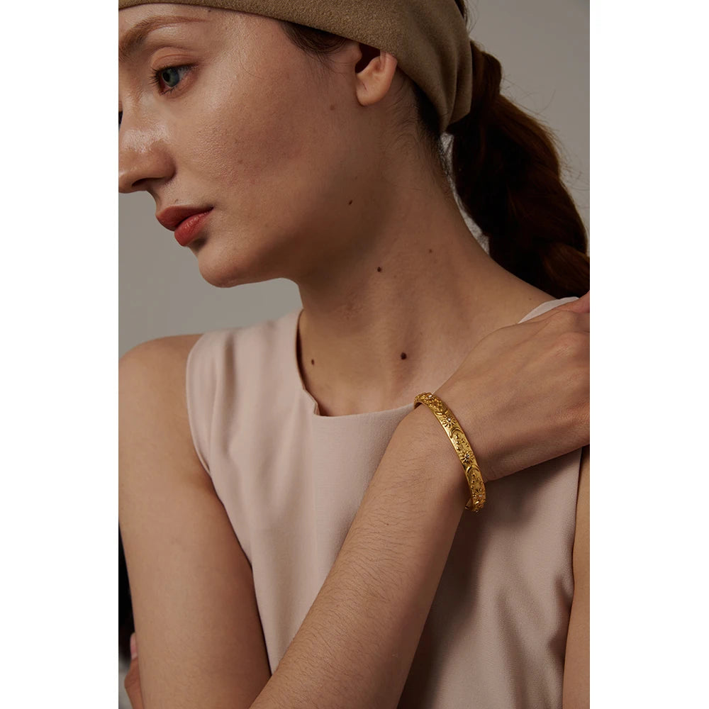 Celestia Engraved Cuff, waterproof bracelet in 316L stainless steel with a gold PVD finish by Lark & Reed, view 3
