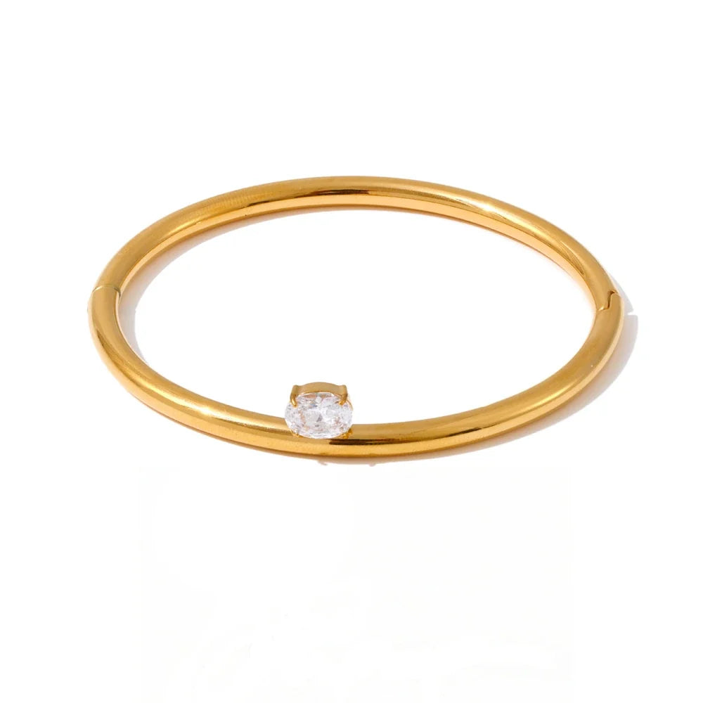 Caprera glat armring med zirkonia, armbånd, tåler vand, rustfrit stål 316L med guld- eller sølvfarvet PVD-belægning, Lark & Reed
