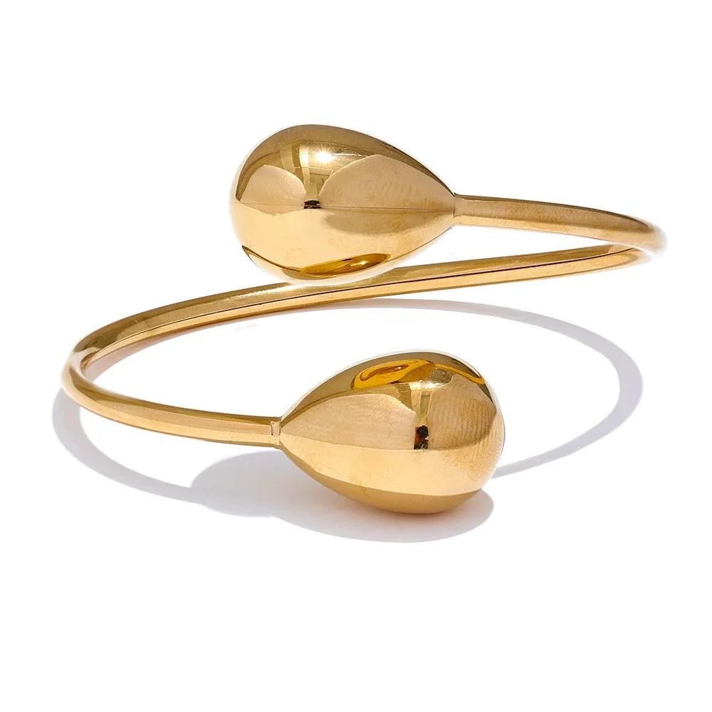 Ischia åben dråbearmring, armbånd, tåler vand, rustfrit stål 316L med guld- eller sølvfarvet PVD-belægning, Lark & Reed