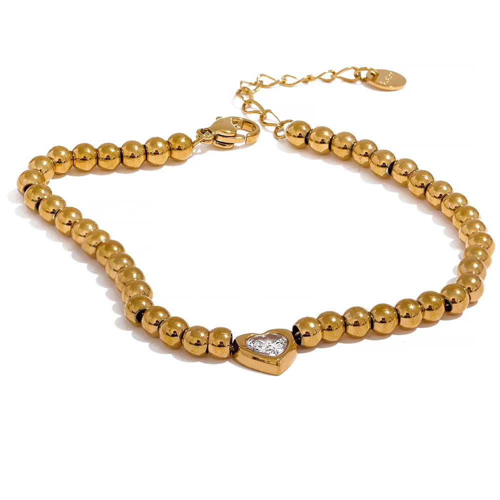 Leonora kuglearmbånd med hjerte, armbånd, tåler vand, rustfrit stål 316L med guld- eller sølvfarvet PVD-belægning, Lark & Reed
