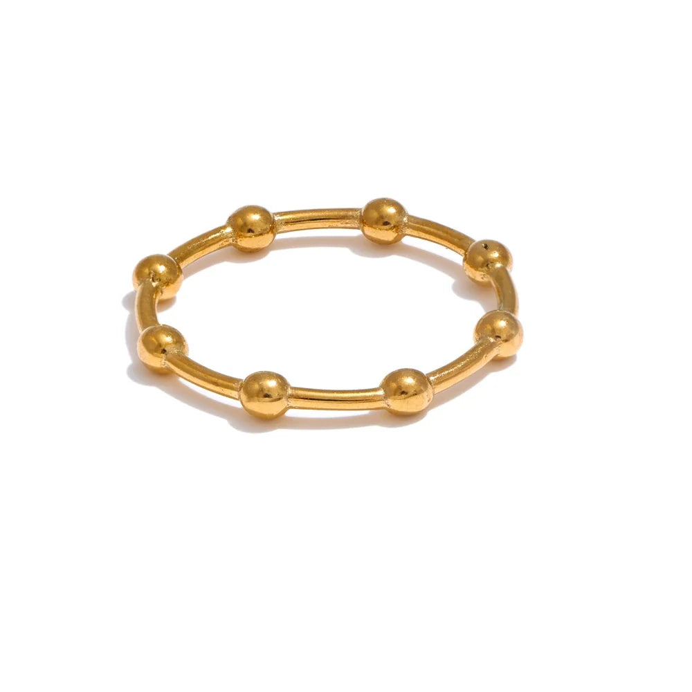 Lotte ring med små kugler, ring, tåler vand, rustfrit stål 316L med guld- eller sølvfarvet PVD-belægning, Lark & Reed